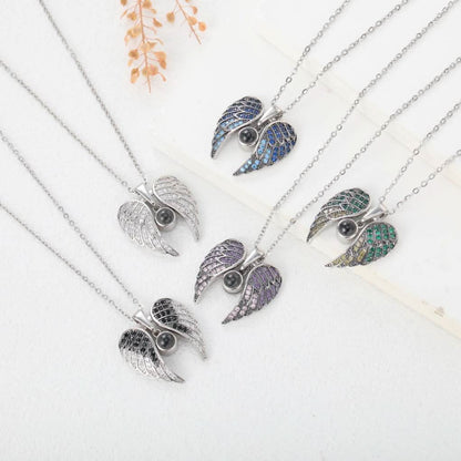 Collier photo commémoratif avec ailes d'ange étincelantes