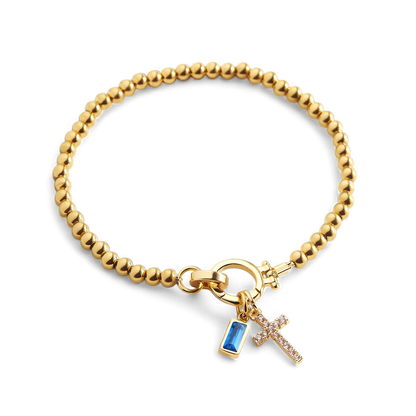 Bracelet avec pierre de naissance et breloque en croix