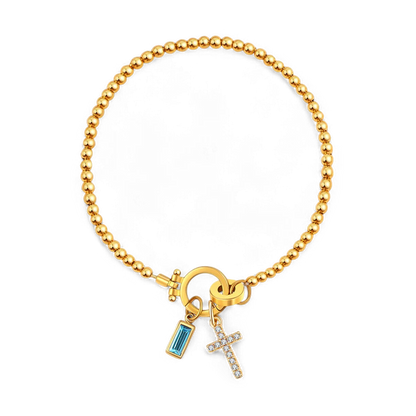 Bracelet avec pierre de naissance et breloque en croix