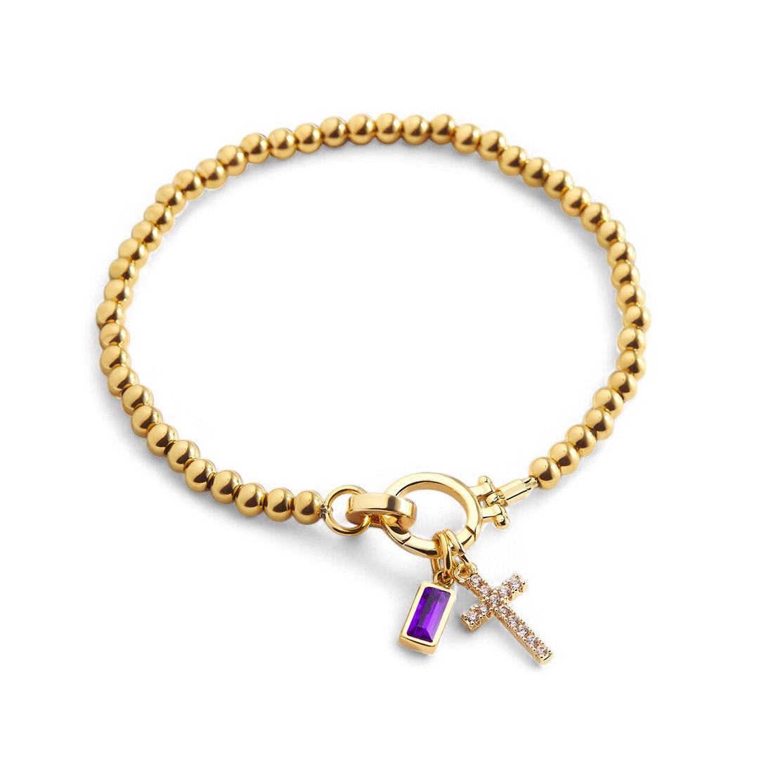 Bracelet avec pierre de naissance et breloque en croix