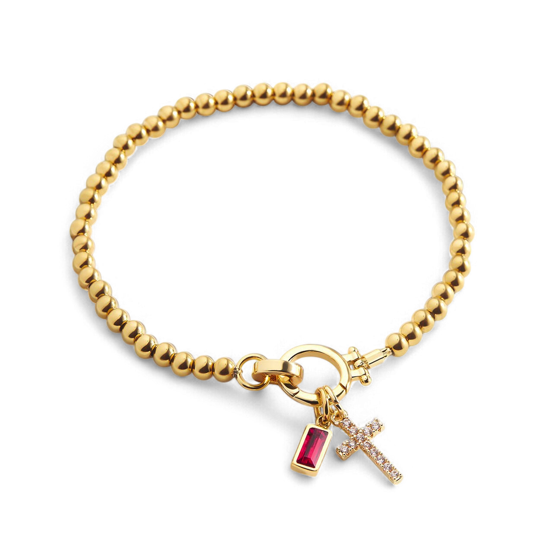Bracelet avec pierre de naissance et breloque en croix