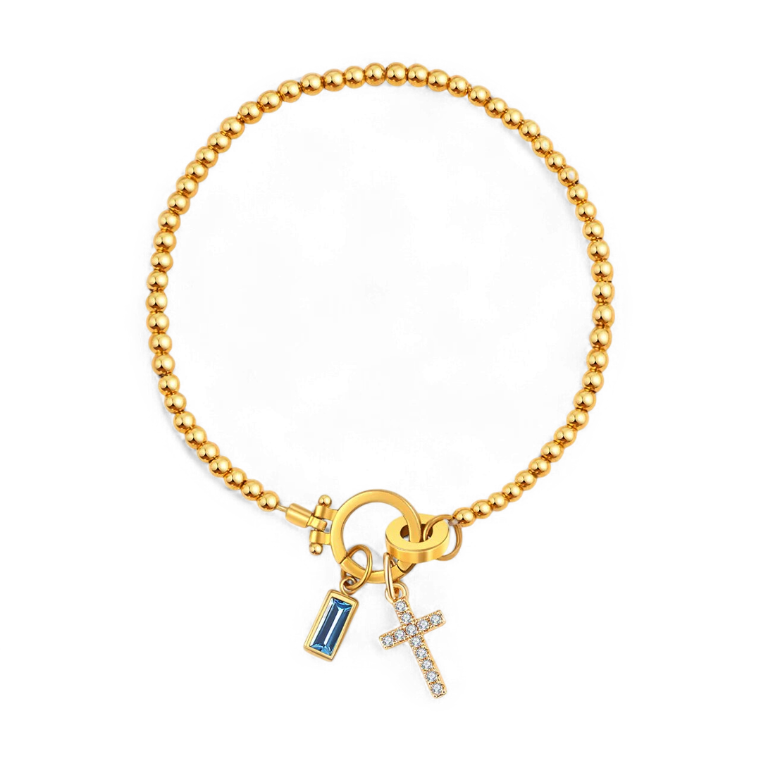 Bracelet avec pierre de naissance et breloque en croix