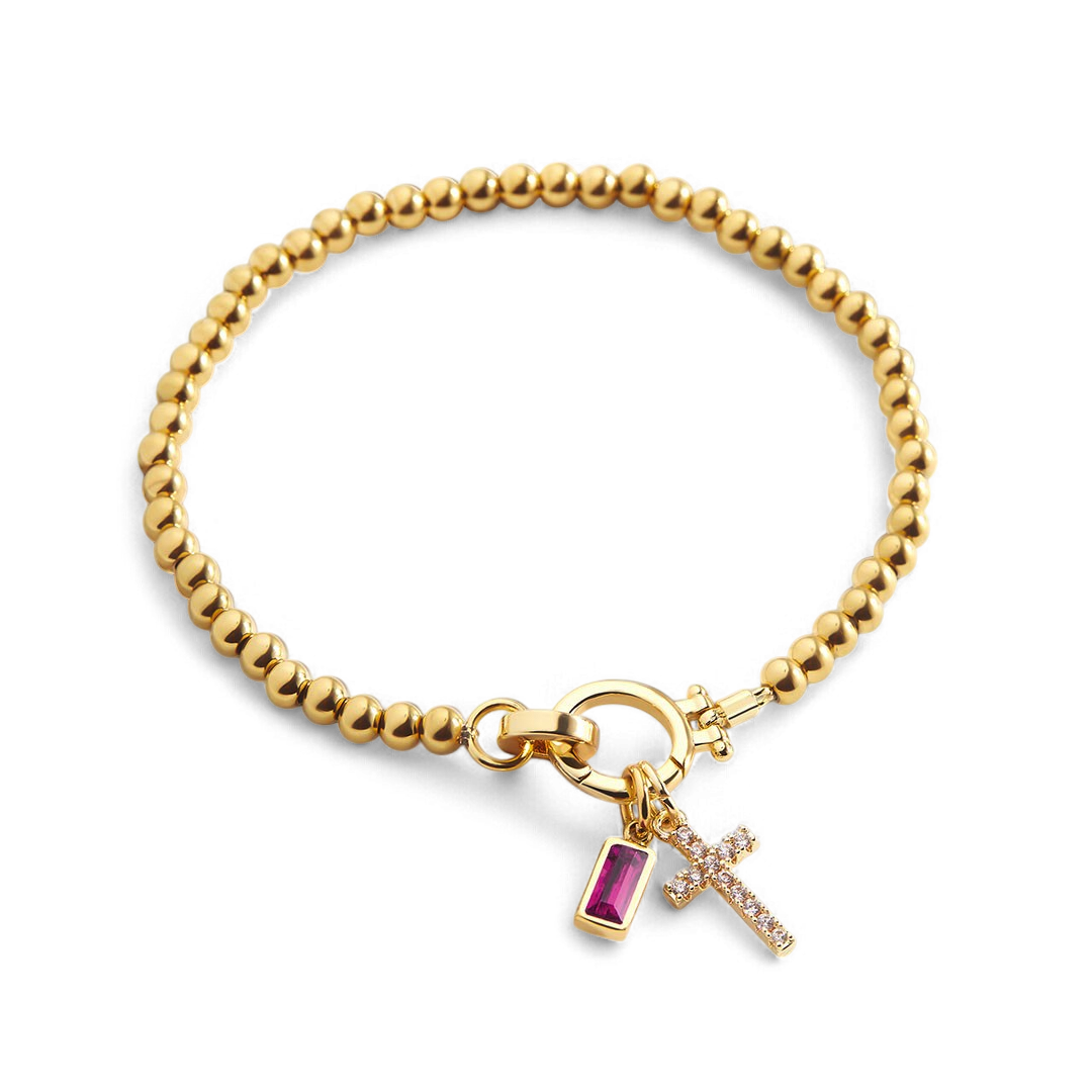 Bracelet avec pierre de naissance et breloque en croix