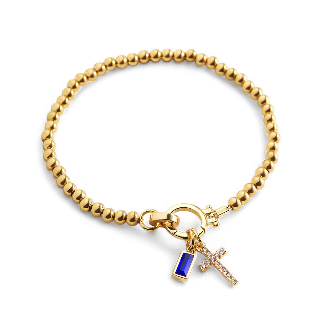 Bracelet avec pierre de naissance et breloque en croix