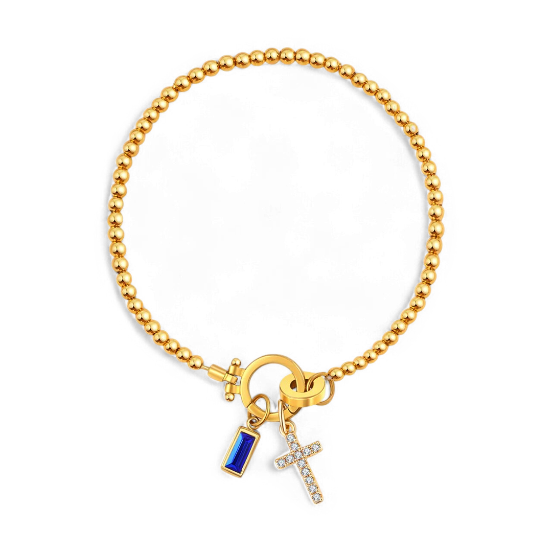 Bracelet avec pierre de naissance et breloque en croix
