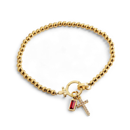 Bracelet avec pierre de naissance et breloque en croix