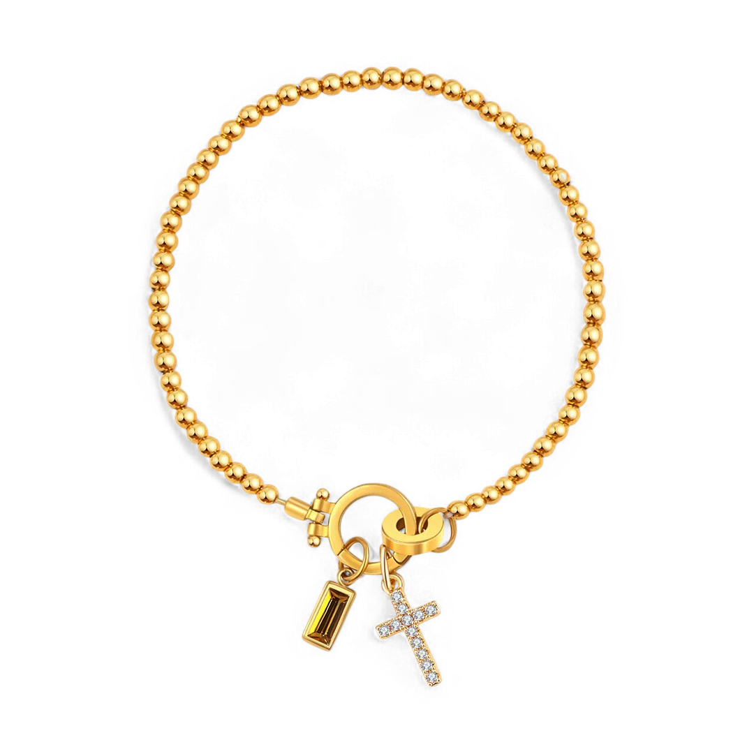Bracelet avec pierre de naissance et breloque en croix