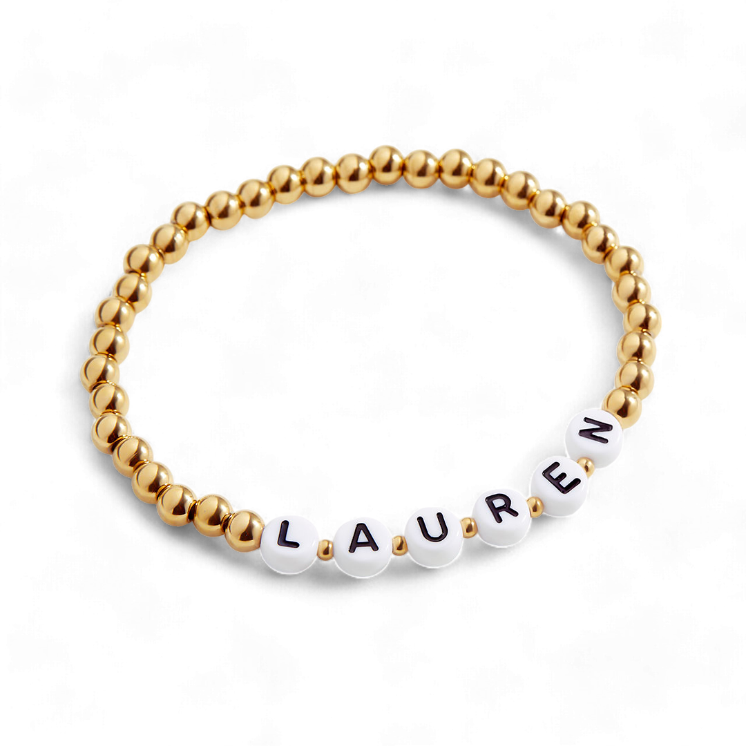 Pulsera personalizada con nombre y cuentas de oro