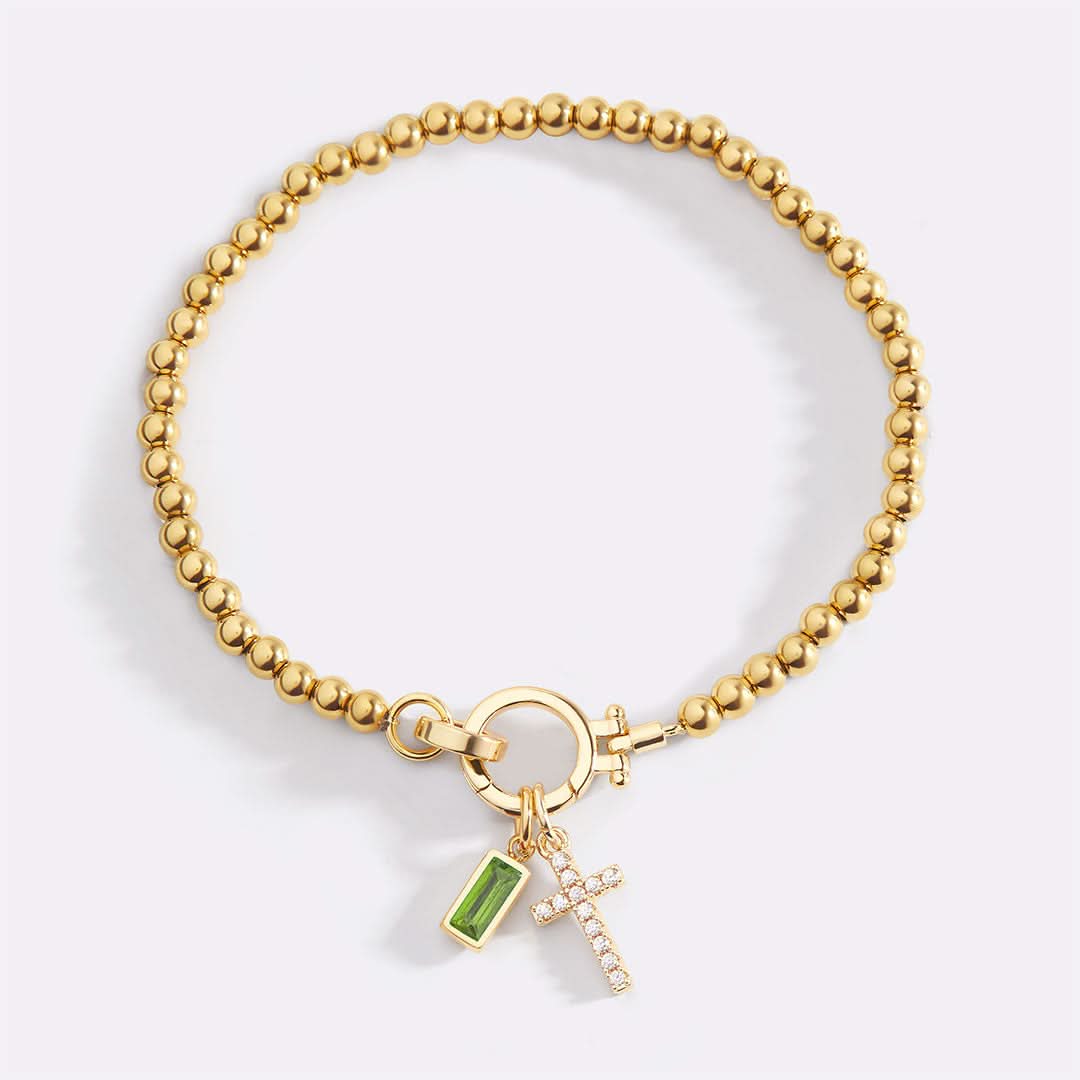 Bracelet avec pierre de naissance et breloque en croix