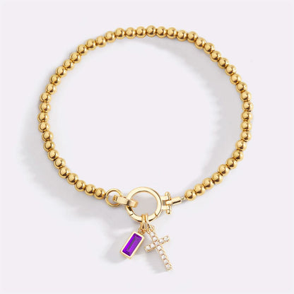 Bracelet avec pierre de naissance et breloque en croix