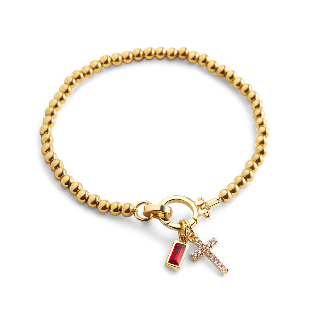 Bracelet avec pierre de naissance et breloque en croix