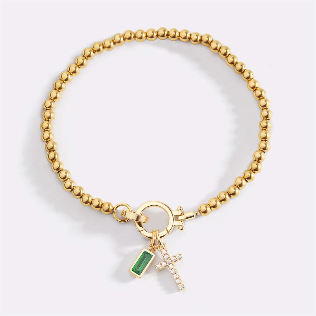 Bracelet avec pierre de naissance et breloque en croix