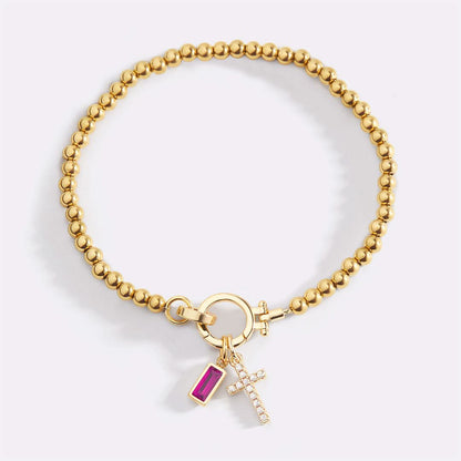 Bracelet avec pierre de naissance et breloque en croix