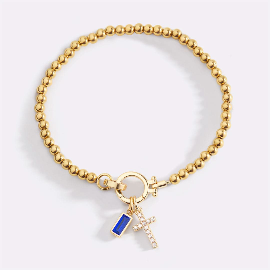 Bracelet avec pierre de naissance et breloque en croix