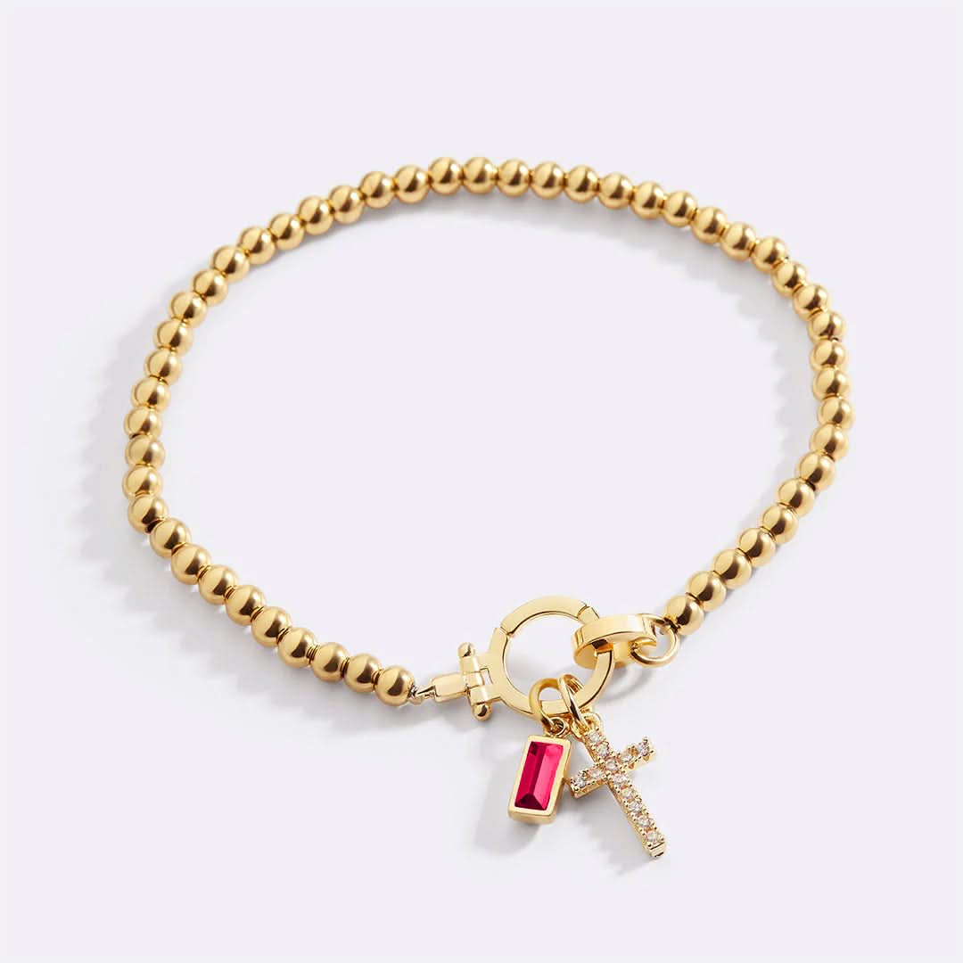 Bracelet avec pierre de naissance et breloque en croix