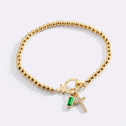 Bracelet avec pierre de naissance et breloque en croix