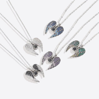 Collier photo commémoratif avec ailes d'ange étincelantes